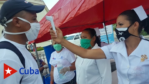 Día de la Patrona de Cuba, despertó diferentes el poblado de El Cobre, con todas las restricciones sanitarias. Texto y foto: Santiago Romero Chang