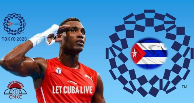 ¡Viva Cuba Libre! Julio César La Cruz sobre el ring olímpico.